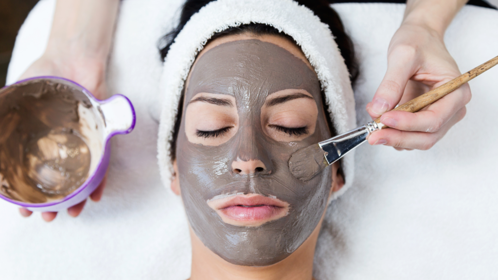 lady applying DIY mask on her face